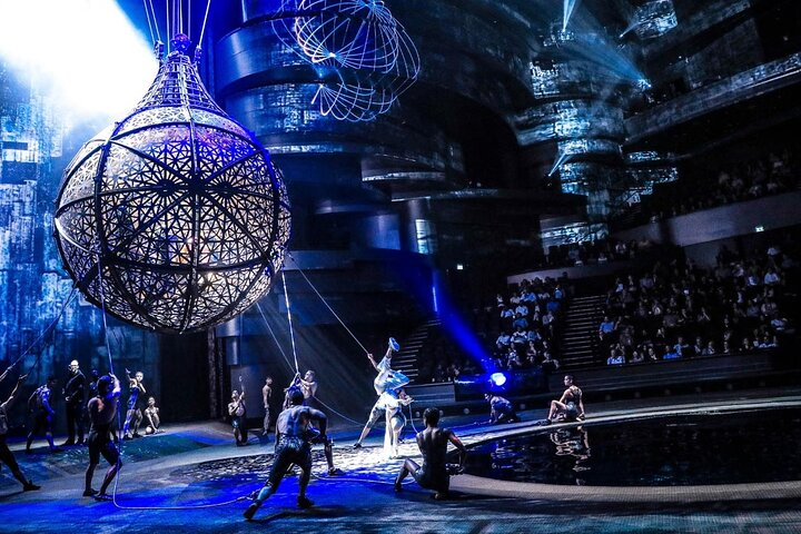 Experience the magic of La Perle where breathtaking acrobatics and mesmerizing aquatic displays unfold in a stunning theatre captivating audiences with each dynamic moment. A true artistic showcase awaits!
